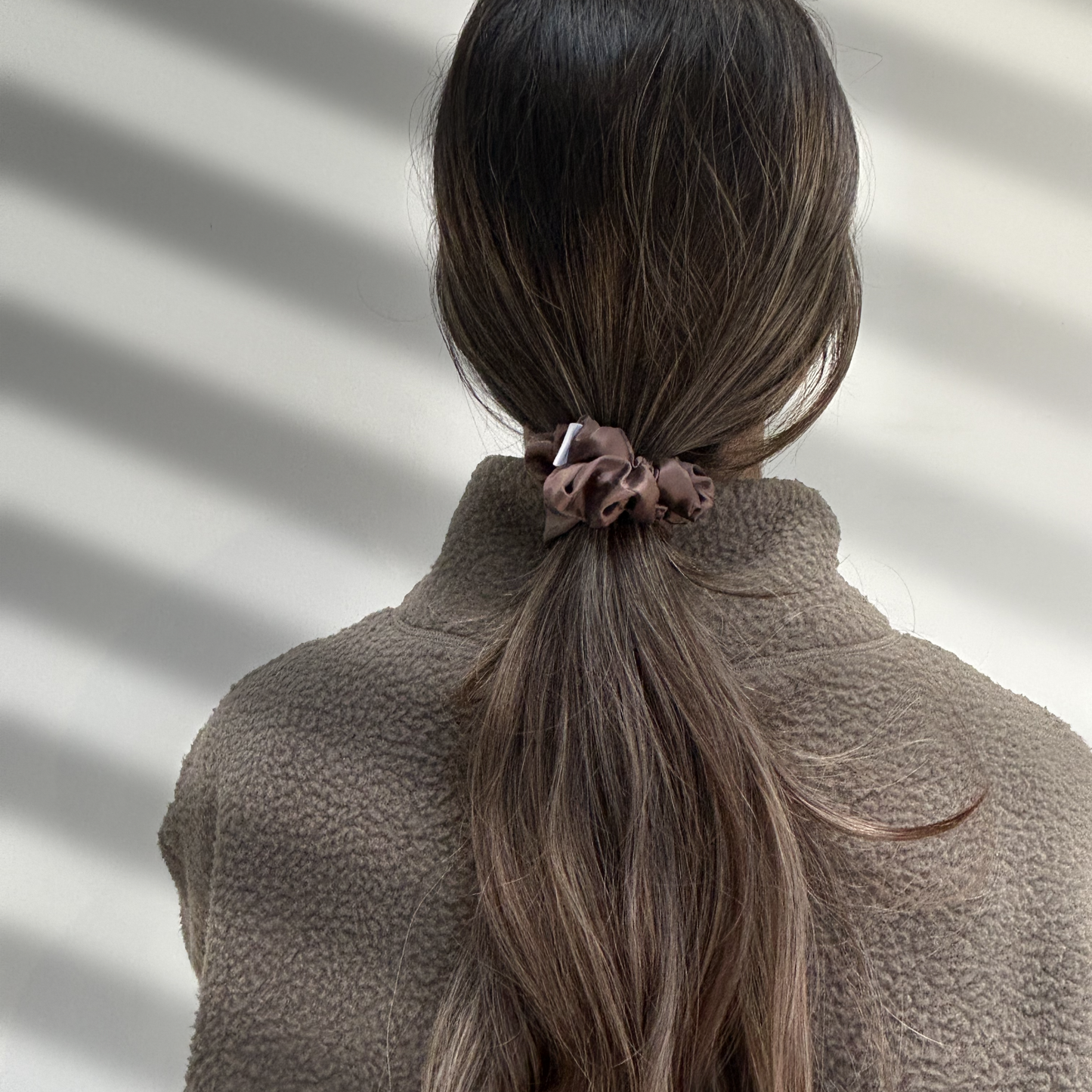 BROWN SCRUNCHIE. ON HAIR