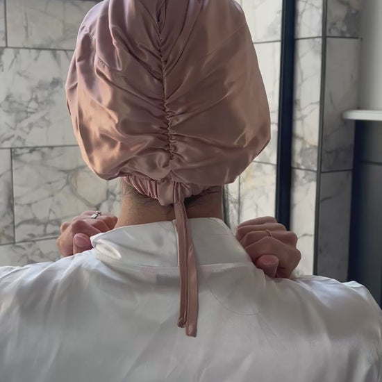 Video model adjusting hair bonnet beautiful hair mulberry silk